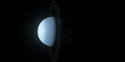 Varför ligger Uranus på sidan?